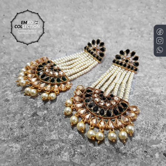 Long black bridal earrings with intricate gold detailing, perfect for weddings, parties, and traditional celebrations