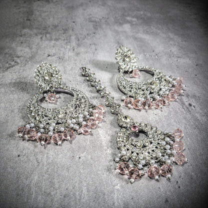 silver and baby pink earrings tikka set