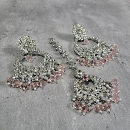 silver and baby pink earrings tikka set