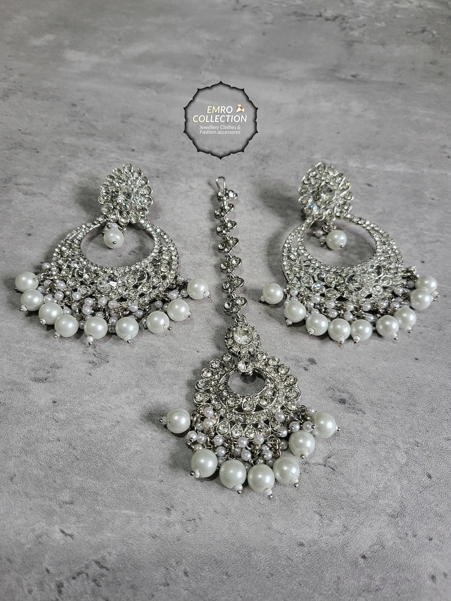 silver earrings and mang tikka set 