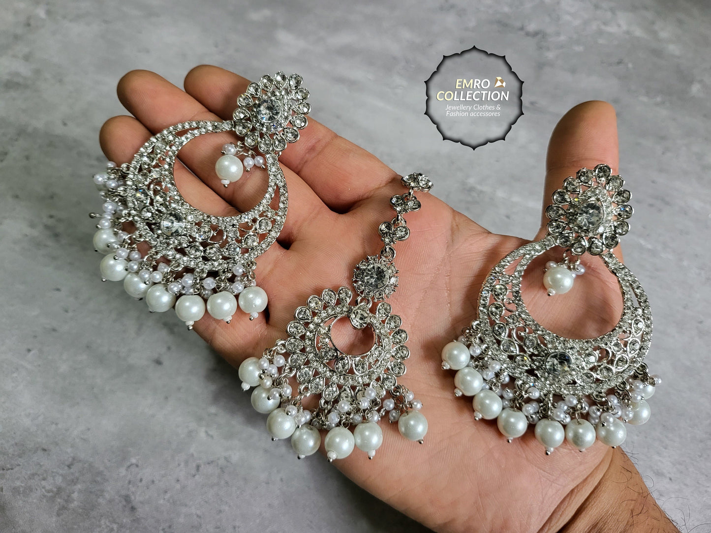 silver earrings and mang tikka set 