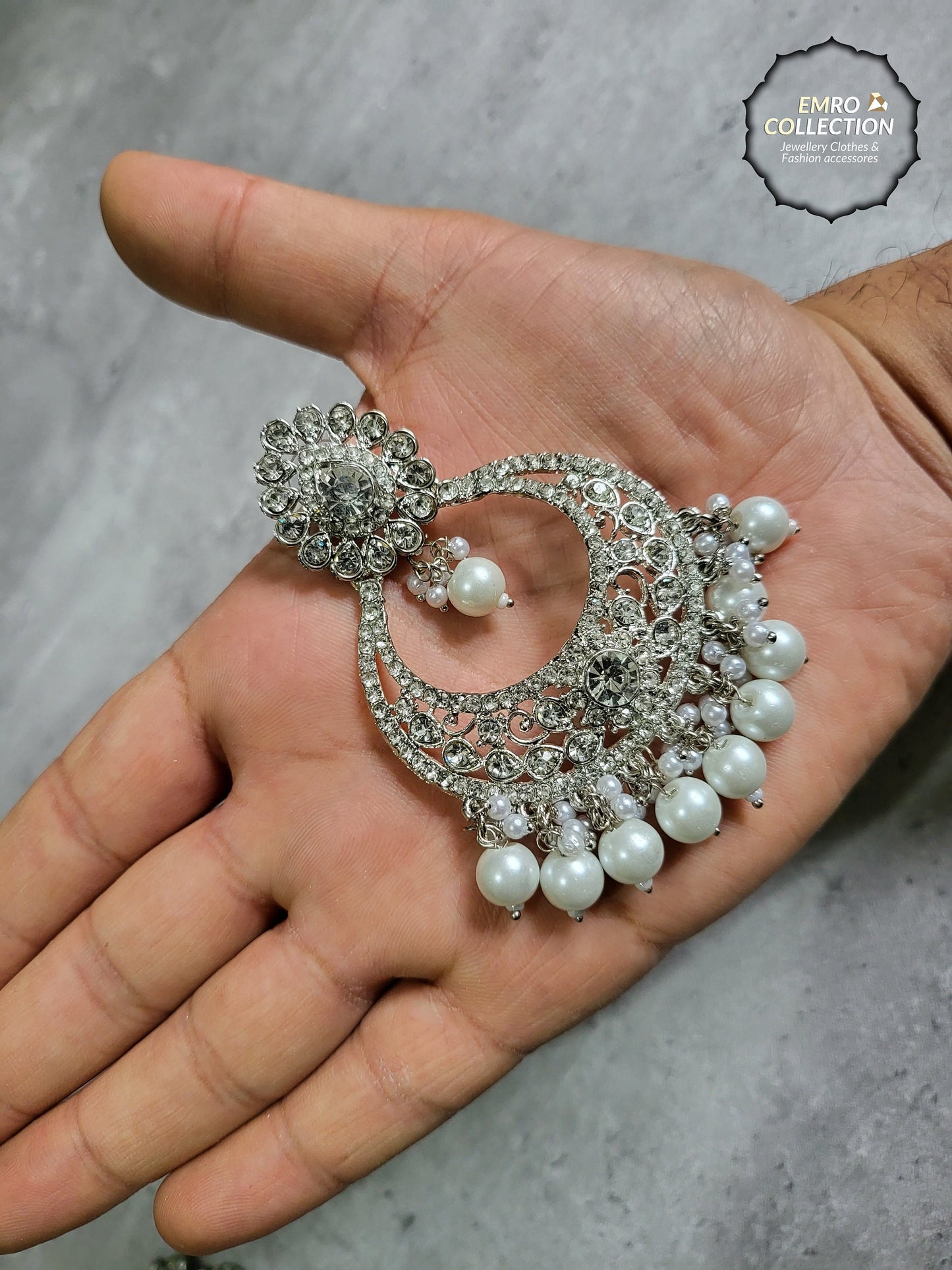 silver earrings and mang tikka set 